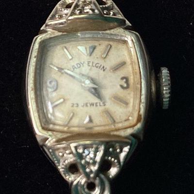 RIHI956 Vintage 14k Gold & Diamond Lady Elgin Dress Watch	23 jewel, in working order, 2 diamond accents top & bottom.
