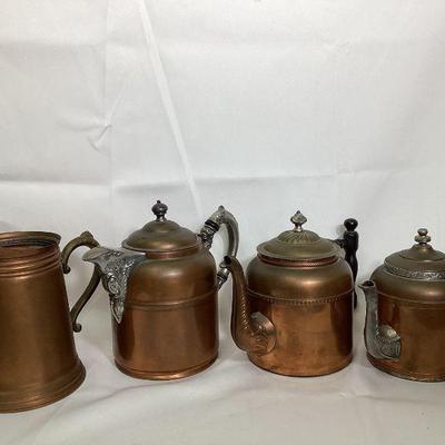 JIFI704 Antique Copper Pots	Copper pots include: Â A Rome Water Pitcher, Rochester Coffee Pot, Sovereign Tea Pot and an unknown.
