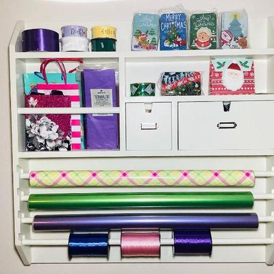 JOSW101 Wall Mounted Gift Wrap Center	Very nice, clean, fresh white, wood wrap & accessories central shelf. Comes with new wrap, ribbon,...