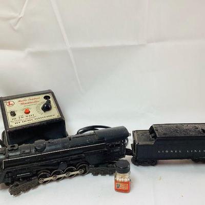 RIHI713 Lionel Trains Collection II	Lot includes a Multi-Control Trainmaster Transformer along with Smoke pellets, and a engine along...