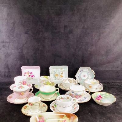 JIFI710 Antigua & Vintage Tea Cups And Signed Limoges	Lot includes 9 tea cups with saucers, 2 signed Limoges and 3 trays. One of the tea...