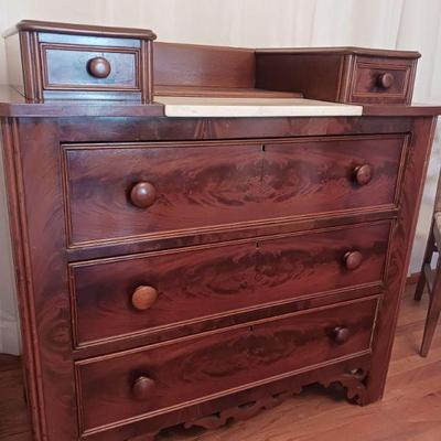 Crotch mahogany 5 drawer chest with marble top