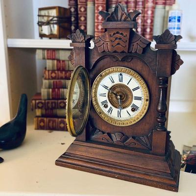 1885 Ansonia 8-Day Tivoli mantle clock. Porcelain dial in a walnut case. Estate sale price: $250