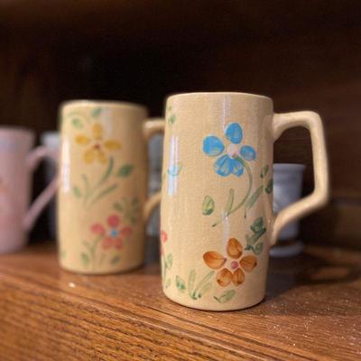 Rosevile pottery handpainted coffe mugs.