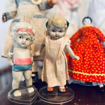 Left doll: $10
Middle doll: $10
Right doll: Hertwig China. $25