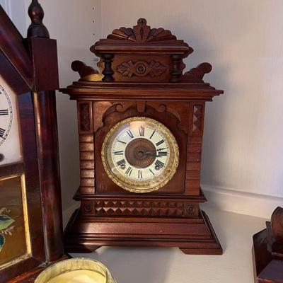 Antique Ansonia oak mantle clock Estate sale price: $250