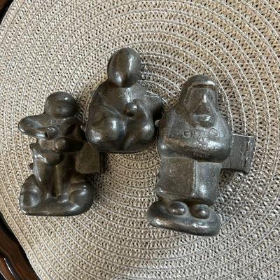 Antique pewter ice cream molds.
Left: Cupid on clouds. $40
Center: Buda. $20
Right: Rare Santa Claus. $90