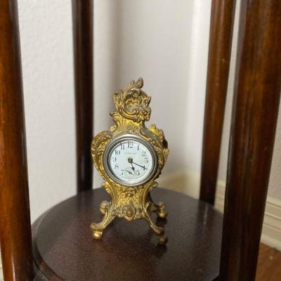 Ornate shelf clock by New Haven Clock Co. Estate sale price: $70