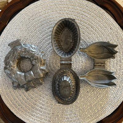 Antique pewter ice cream molds.
Left: Christmas wreath. $90
Center: Fluted basket. $25
Right: Tulip. $20