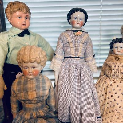 Left boy doll: Minerva doll. $35
Lower left: PET. Marion. Blonde low brow doll. $65
Middle (blue dress): Low brow doll. $75