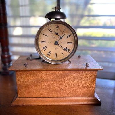 Rare Ansonia alarm on birdseye maple box. Estate sale price: $95