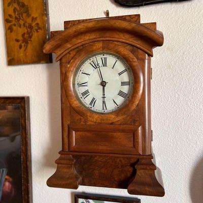 Antique Seth Thomas arch top burl mahogany mantle clock. Estate sale price: $300