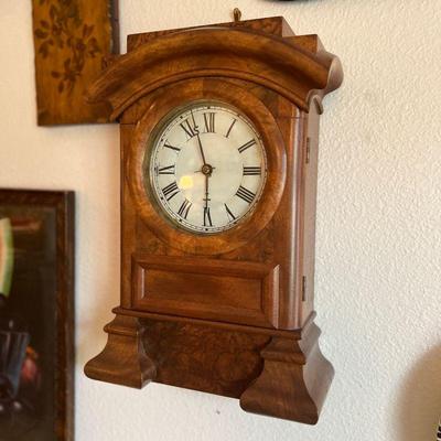 Seth Thomas arch top mantle clock in Burl Maple case. Estate sale price: $300