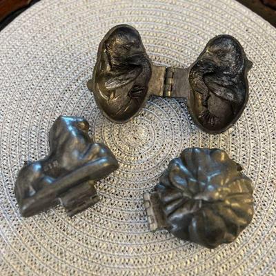 Antique pewter ice cream molds.
Left: Lion. $50
Center: Bird. $60
Right: Flower. $50