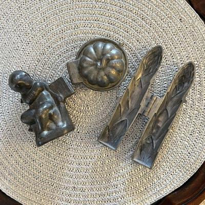 Antique pewter ice cream molds.
Left: Cupid Love. $25
Center: Asparagus. $20
Right: Pie. $30