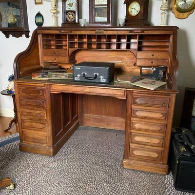 Superb 1920s Oak Roll Top "Derby" Desk. Estate sale price: $225