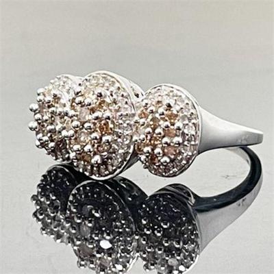 Lot 021   15 Bid(s)
Diamond and 14K White Gold JWBR Fashion Ring