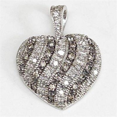 Lot 027   23 Bid(s)
Pave' Diamond 14K White Gold Heart Ed Levin Pendant