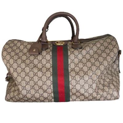 Lot 025   33 Bid(s)
Gucci Savoy Large Duffle Bag