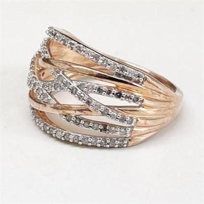 Lot 038   32 Bid(s)
Diamond and 14 K Pink Gold Entwined Ring Band