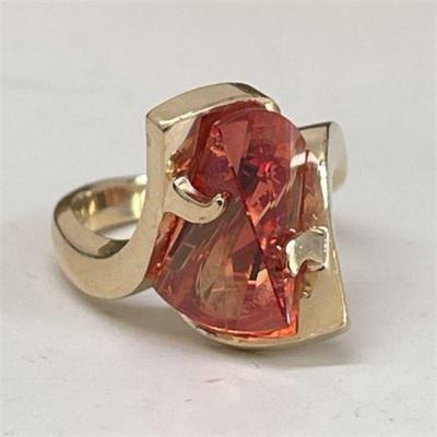 Lot 040   34 Bid(s)
Contemporary Orange Sapphire and 14 K Yellow Gold Ring