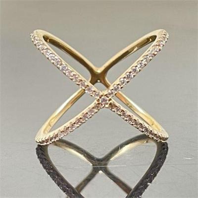 Lot 012   6 Bid(s)
Sterling Criss Cross Ring, Cubic Zirconia and Gold Vermeil