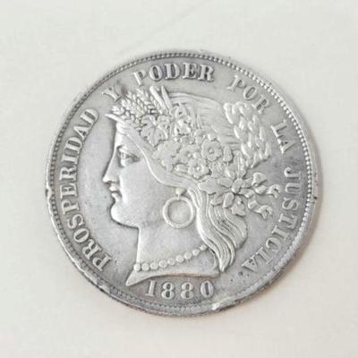 #1406 â€¢ 1880 Peruvian 5 Pesetas Coin
