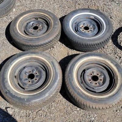 #80312 â€¢ (4) Wheels With Hankock Tires
