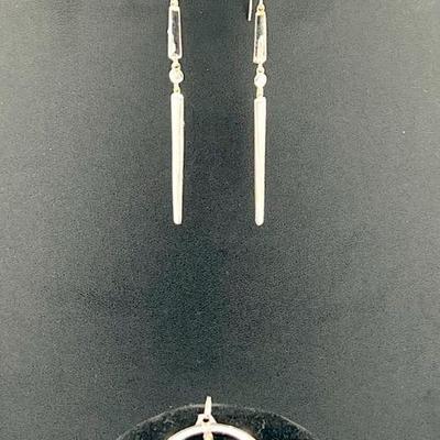 925 Sterling Silver Earrings & Pendant
Elegant sterling silver 925 drop earrings and 
Vintage Sterling Silver Zodiac Libra Sign Pendant...