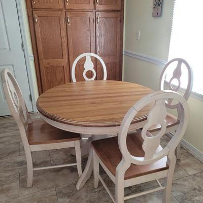 Kitchen table has one leaf ( not inserted in photo)