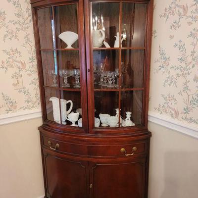 Small curved front china cabinet