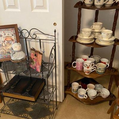 5 tiered corner shelf full of tea and coffee cups
