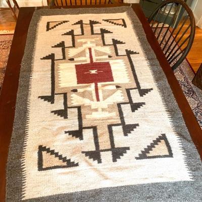 Woven rug, 31 x 57 in.