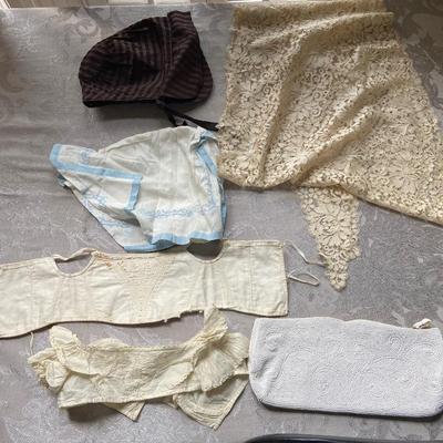 Vintage bonnets, lace shawl tiny underclothes 