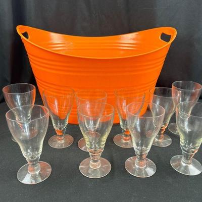 10 Glasses & Orange Container
