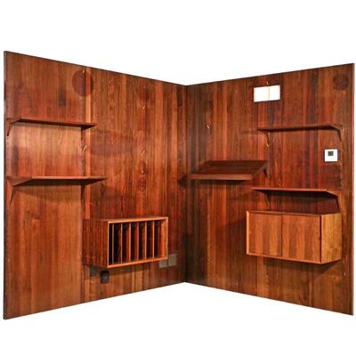 POUL CADOVIUS / CADO ROSEWOOD WALL UNIT | Rosewood veneered; having five [5] 96 x 31.5 in. panels with five shelves, one open cabinet...