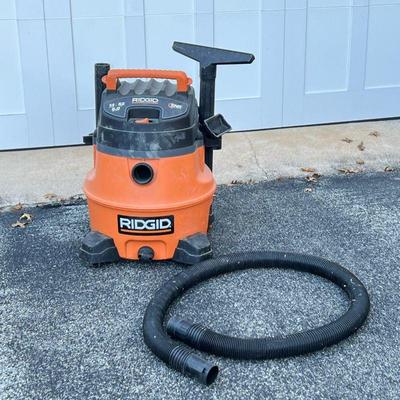 RIGID 14 GALLON SHOP-VAC | Model WD14500 w/ hose and accessories Tested working Needs new filter - h. 27 x dia. 20 in
