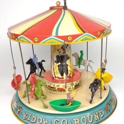 Unique Art Tin Wind-Up Kiddy Go Round Toy