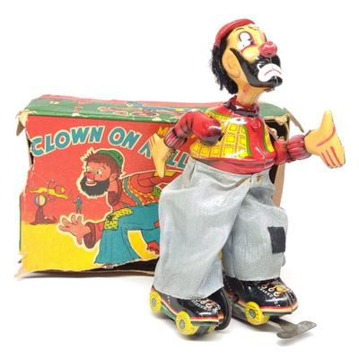 TPS Tin Wind-Up Clown on Roller Skates w/ Box