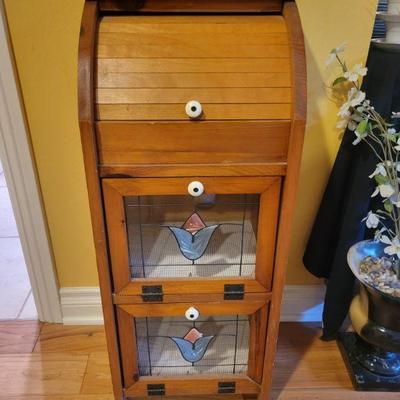 13.5x11.5x34 
small storage cabinet with roller top and leaded glass doors