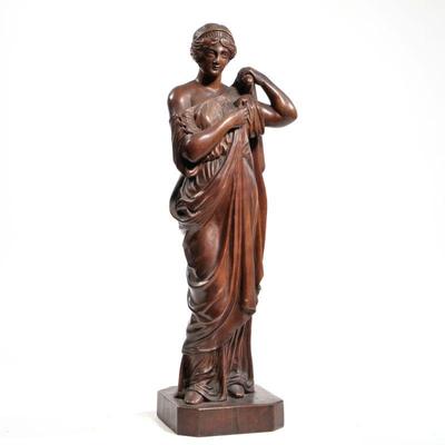 ANTIQUE CARVED WOOD FIGURE | An antique intricately carved wood figure of a woman donning a robe, no apparent signature - h. 21.25 in.