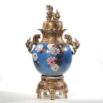 LARGE LIDDED CHINESE VASE ON STAND | Intricate and colorfully painted lidded Chinese vase with gilt foo dog figurine on top and side with...