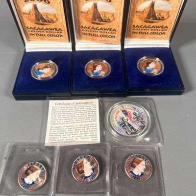 (3) Sacagawea Golden Dollars In Full Color, (1) American Heroes Silver Dollar .999, (3) Susan B Anthony Dollars In Full Color 