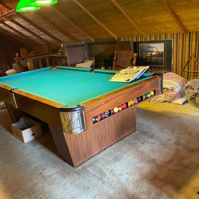 Regular size pool table with leather pool pocket from Schmitt 