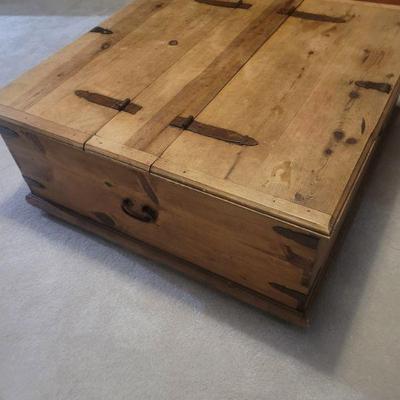 Coffee table with hidden storage space