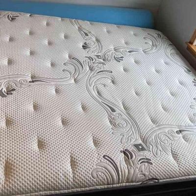 King bed always covered with mattress protector. 