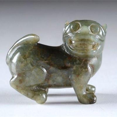 Lot 004   1 Bid(s)
Antique Chinese Celadon and Brown Jade Netske Foo Dog Amulet