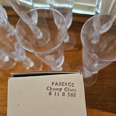 Set of 8 Faberge frosted & clear crystal champagne flutes. Kissing Doves model, etched signed on bottoms with original boxes.