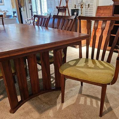 MCM teak dining table & chairs with 2 leaves.