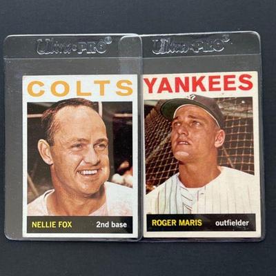1964 Topps #205: Nellie Fox and #225: Roger Maris. Fox was elected the HOF in 1997 and Maris broke Babe Ruthâ€™s record for HRs in a...
